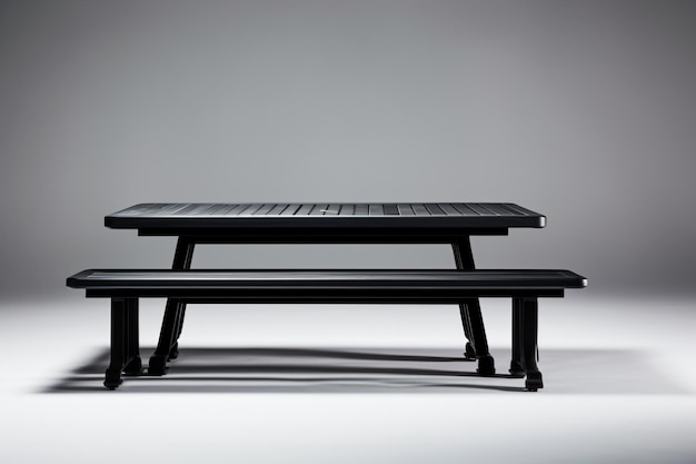 una mesa de picnic negra con un banco debajo