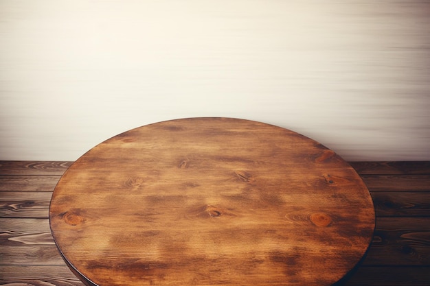 Foto una mesa redonda de madera está colocada frente a una pared blanca