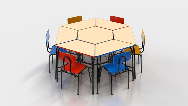 Foto mesa y silla escolar hexagonal de colores para niños en el aula