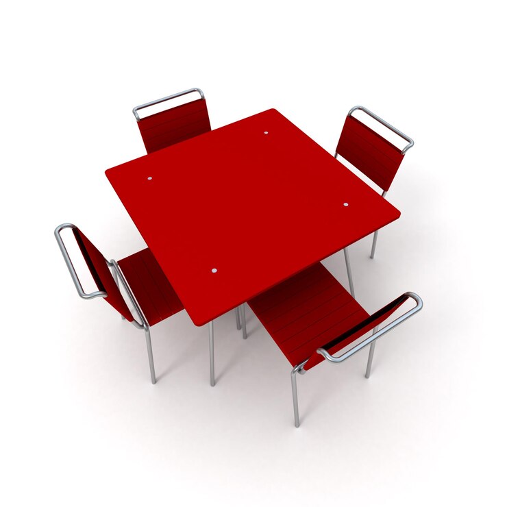 Foto mesa y sillas de metal y plástico rojo.