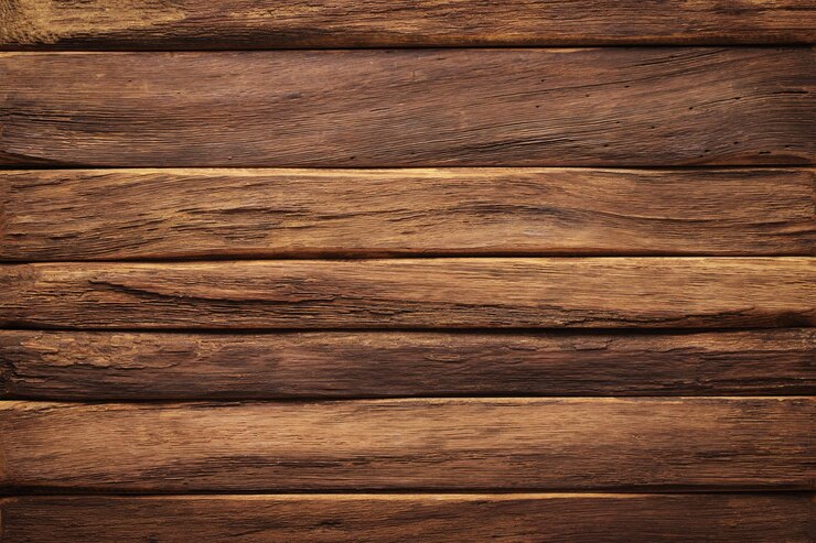 Mesa de tablones oscuros de textura de madera con espacio vacío
