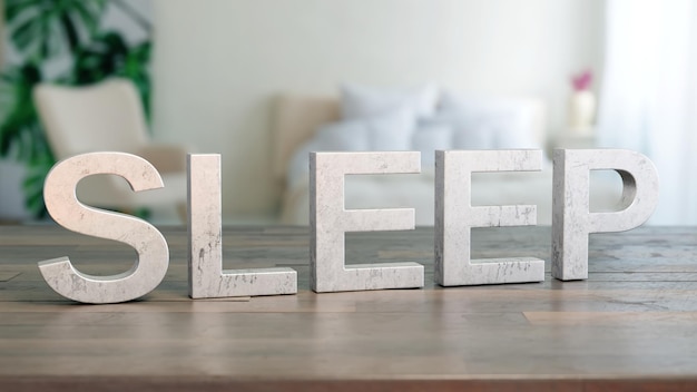 Metallbuchstaben buchstabieren Schlaf auf einem Holztisch in einem hellen Schlafzimmer
