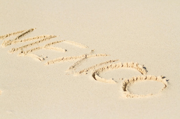 México escrito na praia com onda.