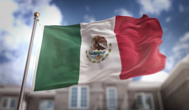 Foto mexiko-flagge 3d-rendering auf blauem himmel gebäude hintergrund