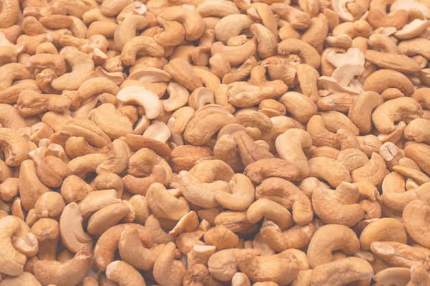 Foto mezcla de sabrosas nueces saladas un grupo de almendras pistachos nueces macadamia anacardos