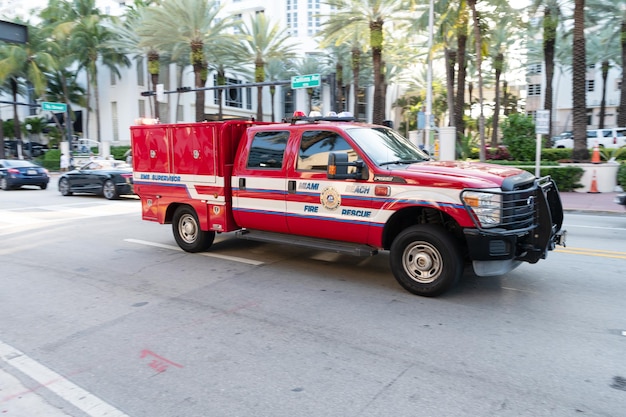 Miami Beach Florida USA 15. April 2021 Red Ford Fire Rescue Truck in Miami Beach Side View Emergency 911