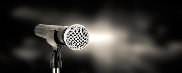 Microfone com fundo de luz de palco para conceito de desempenho de comentário de fala e falar em público