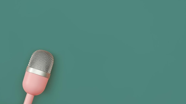 Microfone rosa para podcasts em fundo verde Conceito de tecnologia e equipamento de áudio