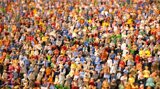 Foto mini figur menge menschen sitzen im stadion