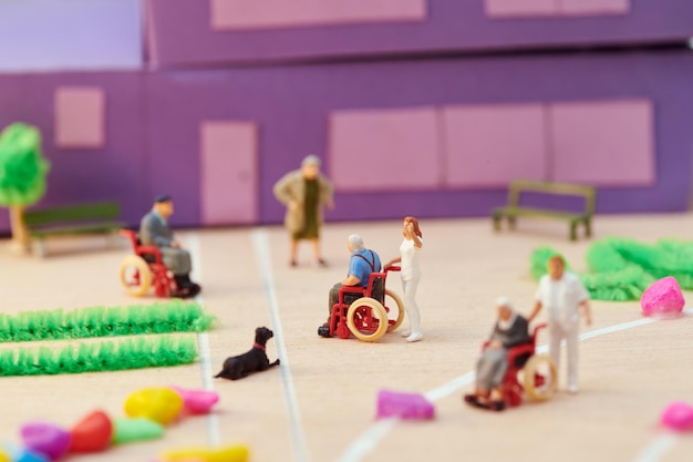 Miniatur-Hospizpatienten und Krankenschwestern