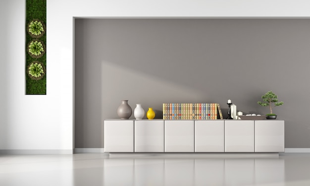 Minimalistisches Wohnzimmer mit Sideboard mit Buch- und Dekorationsobjekten