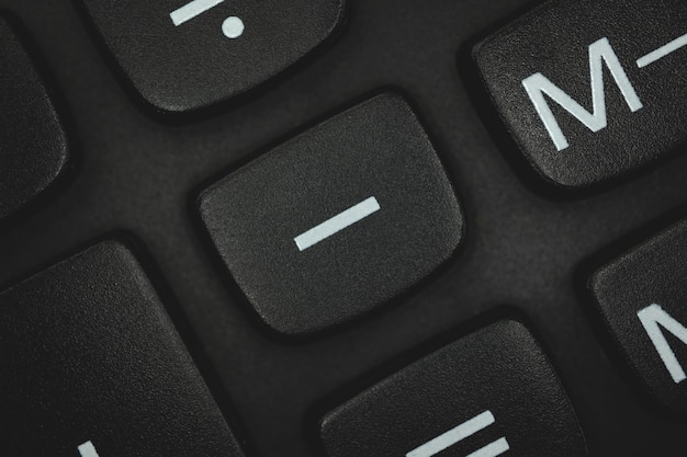 Minuszeichen und Symbol, Taschenrechner-Tastaturknopf-Nahaufnahmefoto