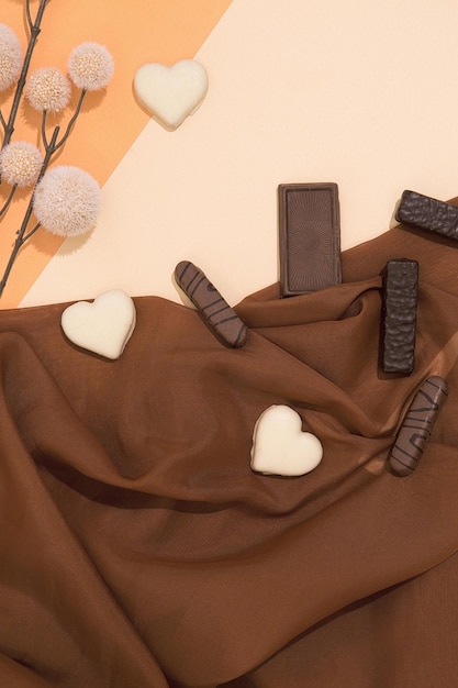 Mistura de doces de chocolate e têxtil de decoração marrom Doces choco lover concept
