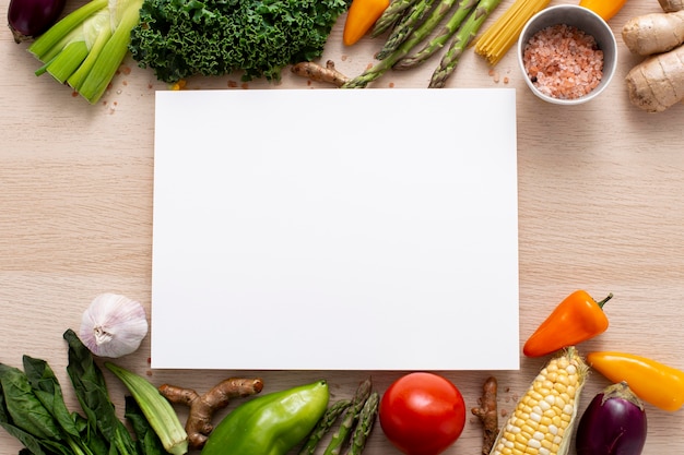 Foto mistura plana de vegetais com retângulo em branco