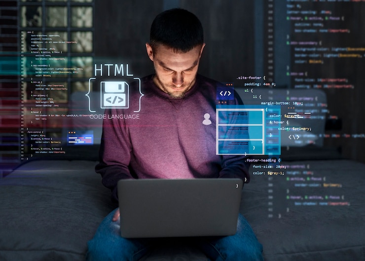 Foto mittelgroßer mann, der am laptop arbeitet