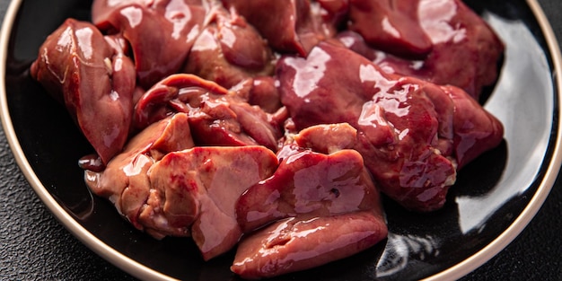 miudezas de fígado de frango cru refeição lanche comida na mesa cópia espaço comida fundo rústico