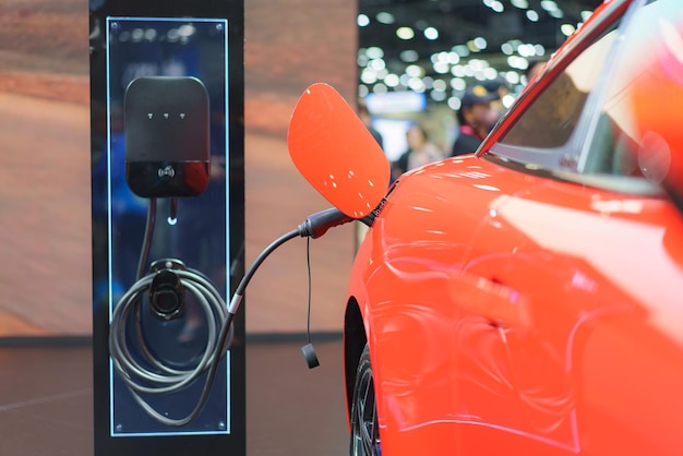 Foto mobilidade verde em ação carregamento de carros elétricos na estação