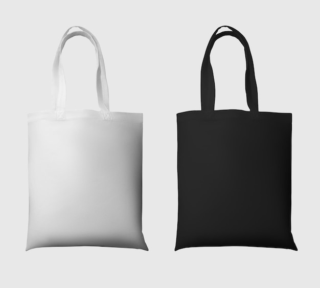 Foto mock up de ecobag de renderização 3d totebag preta branca com alça de compras isolada no conjunto de fundo