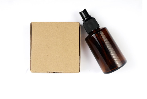 Mockup botella de perfume color marrón y caja Empaque foto de descarga gratuita