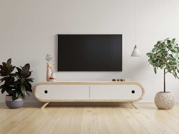 Mockup einer TV-Wand, die in einem Wohnzimmer mit einer weißen Wand montiert ist. 3D-Rendering