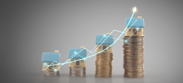 Modellhaus-Mock-up und Münzen-Immobilien-Investmentkonzept