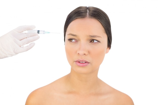 Modelo de modelo preocupado com injeção de botox