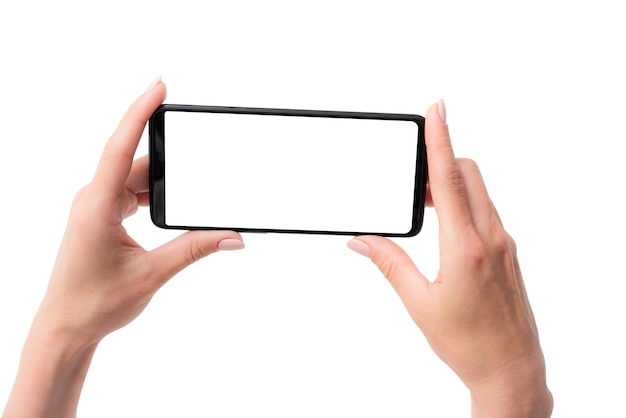 Modelo de smartphone moderno em mãos para seu projeto