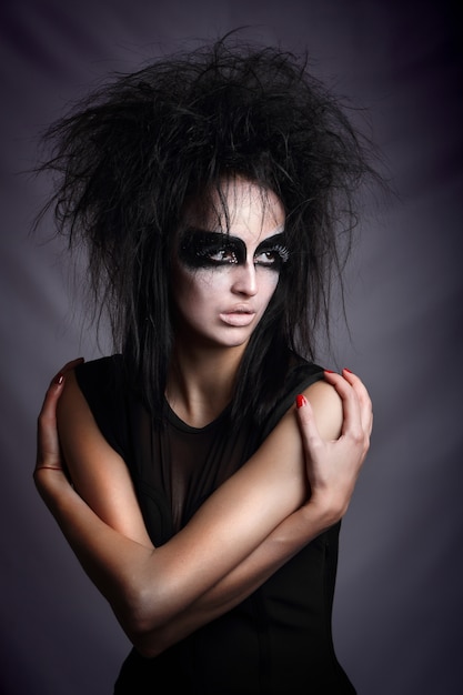 Foto modelo de estudio de maquillaje de brujas