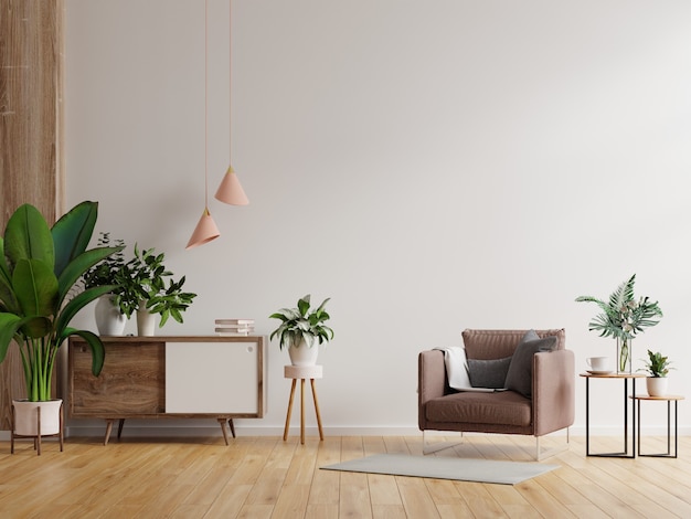 Modernes minimalistisches Interieur mit einem Sessel auf leerem weißen Wandhintergrund. 3D-Darstellung