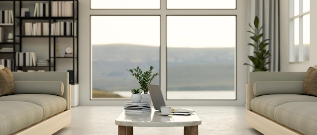 Modernes und komfortables Wohnzimmer mit gemütlichem Sofa-Couchtisch-Fenster mit Blick auf die Natur