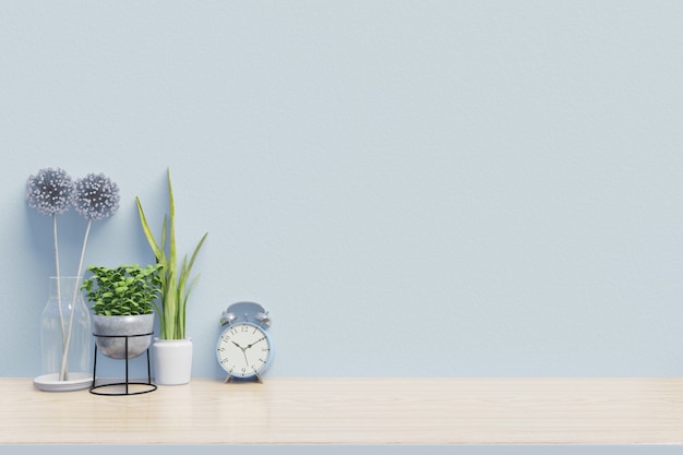 El moderno lugar de trabajo con un escritorio creativo con plantas tiene una pared azul, renderizado 3d