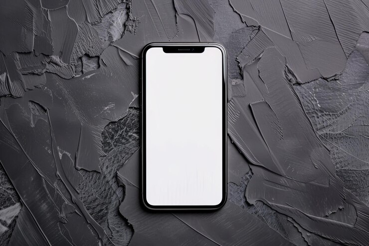 Moderno modelo de teléfono con pantalla blanca en blanco sobre fondo oscuro