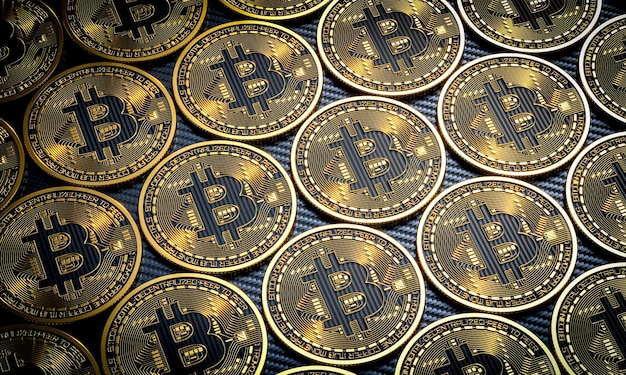 Moedas de bitcoin em fundo de fibra de carbono