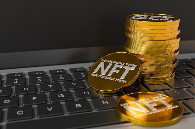 Foto moedas nft empilhadas em cima de um teclado de laptop