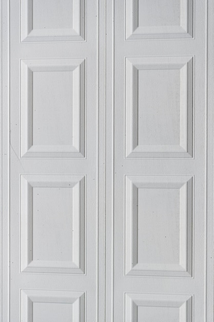 Moldura de panel de puerta blanca con fondo texturizado en toda la superficie