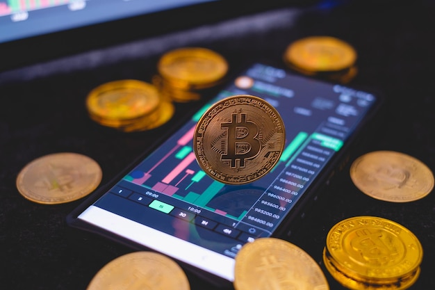 Foto moneda de oro bitcoin