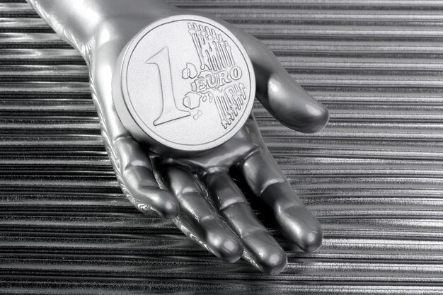 Moneda de plata euro de mano de plata metálica futurista