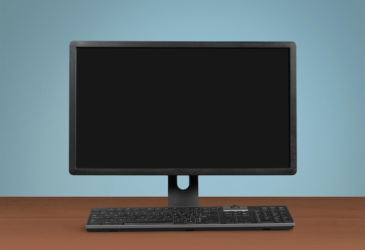 Foto monitor de computadora en blanco en el escritorio
