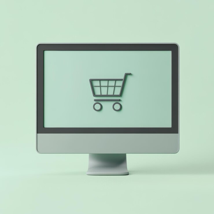 Foto un monitor de computadora con un carrito de compras en la pantalla