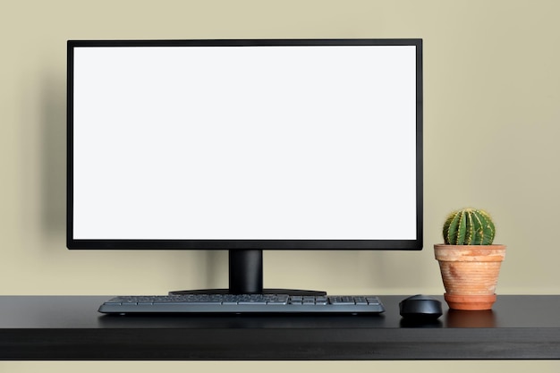 Foto monitor de escritorio en blanco moderno en la oficina con una decoración mínima en la mesa con interior marrón neutro