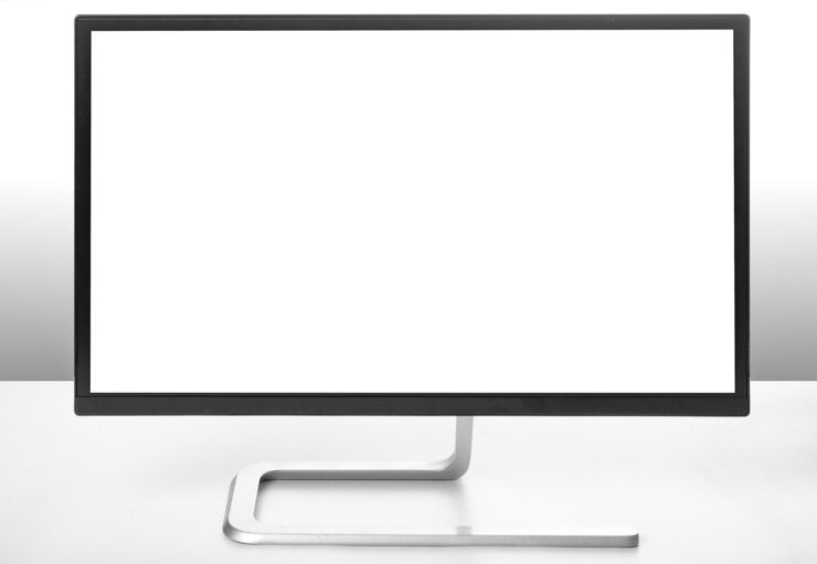 Foto monitor moderno na mesa branca e luz