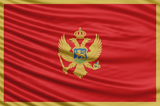 Foto montenegro flag wave close up, fundo da bandeira nacional