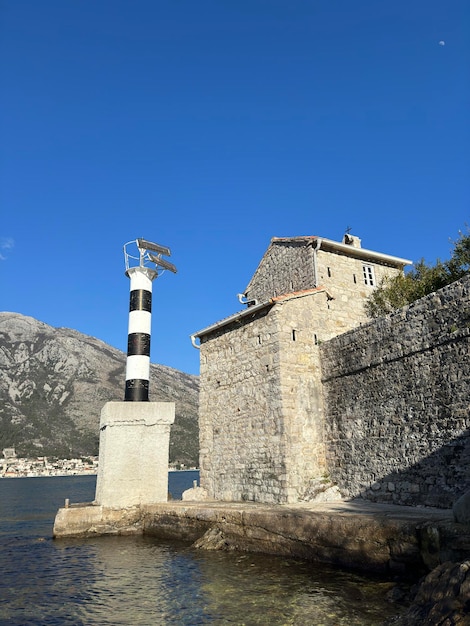 Montenegro Fort Verige mar Boca Kotor Bay Perast Igreja de Nossa Senhora dos Anjos pedras de musgo tijolos nat