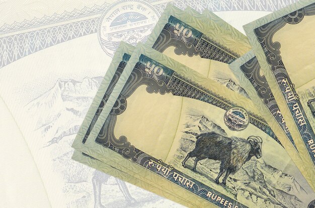 Montón de billetes de rupias nepalesas