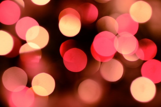 Foto un montón de bokeh chispeante de oro de las luces de la guirnalda defocused.