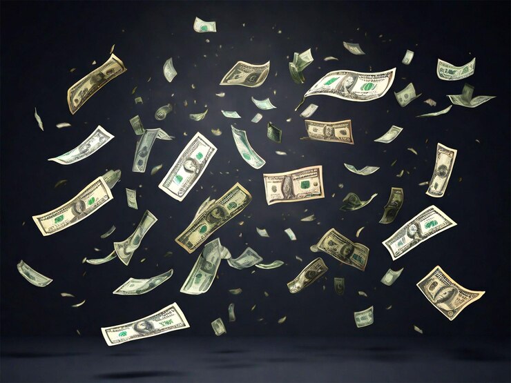 un montón de dinero volando en el aire