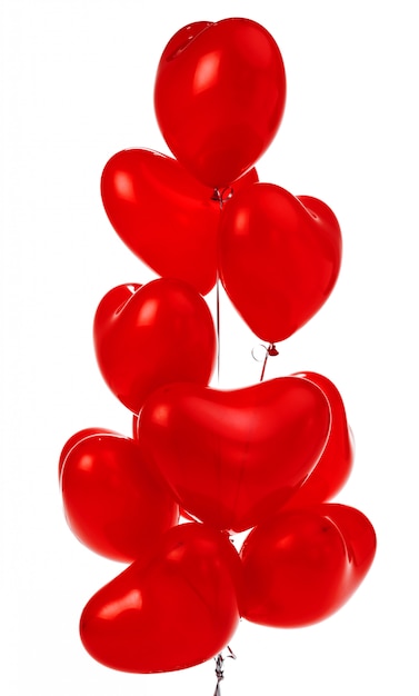 Montón de globos rojos en forma de corazón