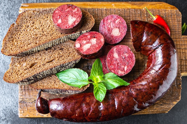 morcela salsicha sangrenta Cozinhar alimentos gordurosos na mesa comida saudável refeição lanche cópia espaço