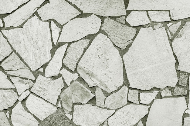 Mosaico muro de piedra gris