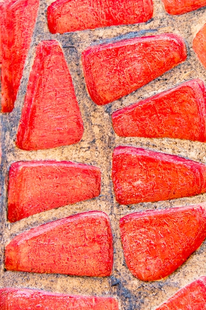 Mosaico vermelho no chão